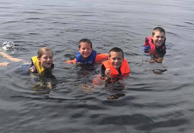 Kids Swimming in Whitefish Bay